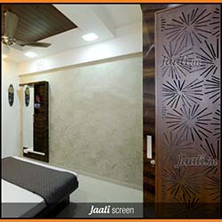 Abstract MDF Jaali screen partition in bedroom.jpg